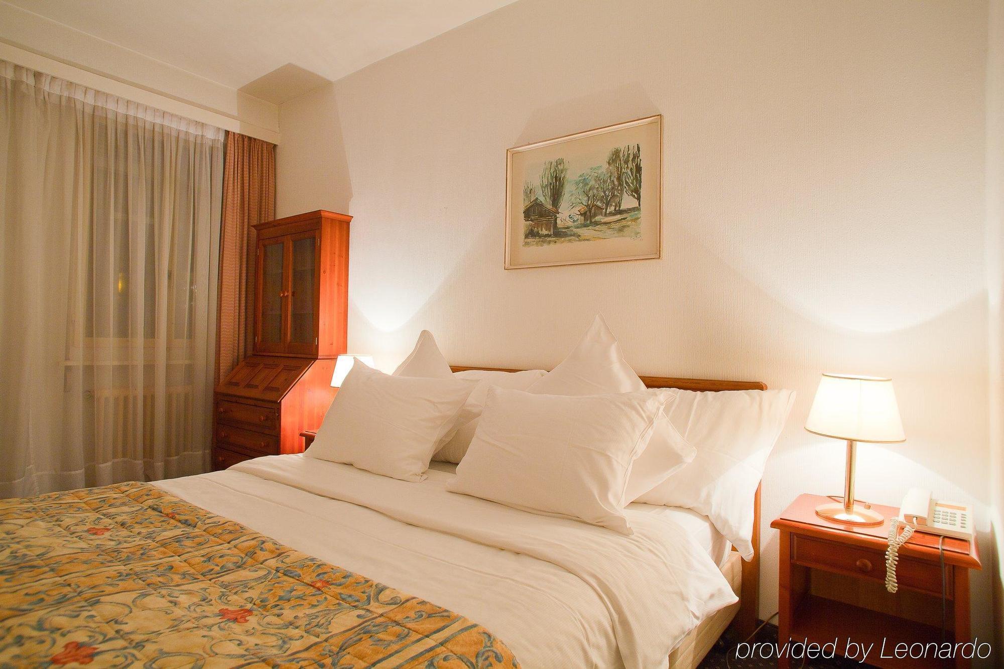 Hotel Sagitta Genebra Quarto foto